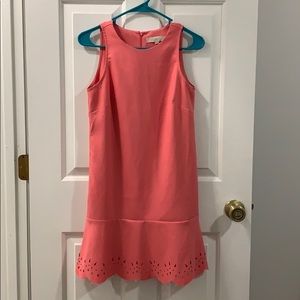 Adorable peach dress with cutouts in skirt